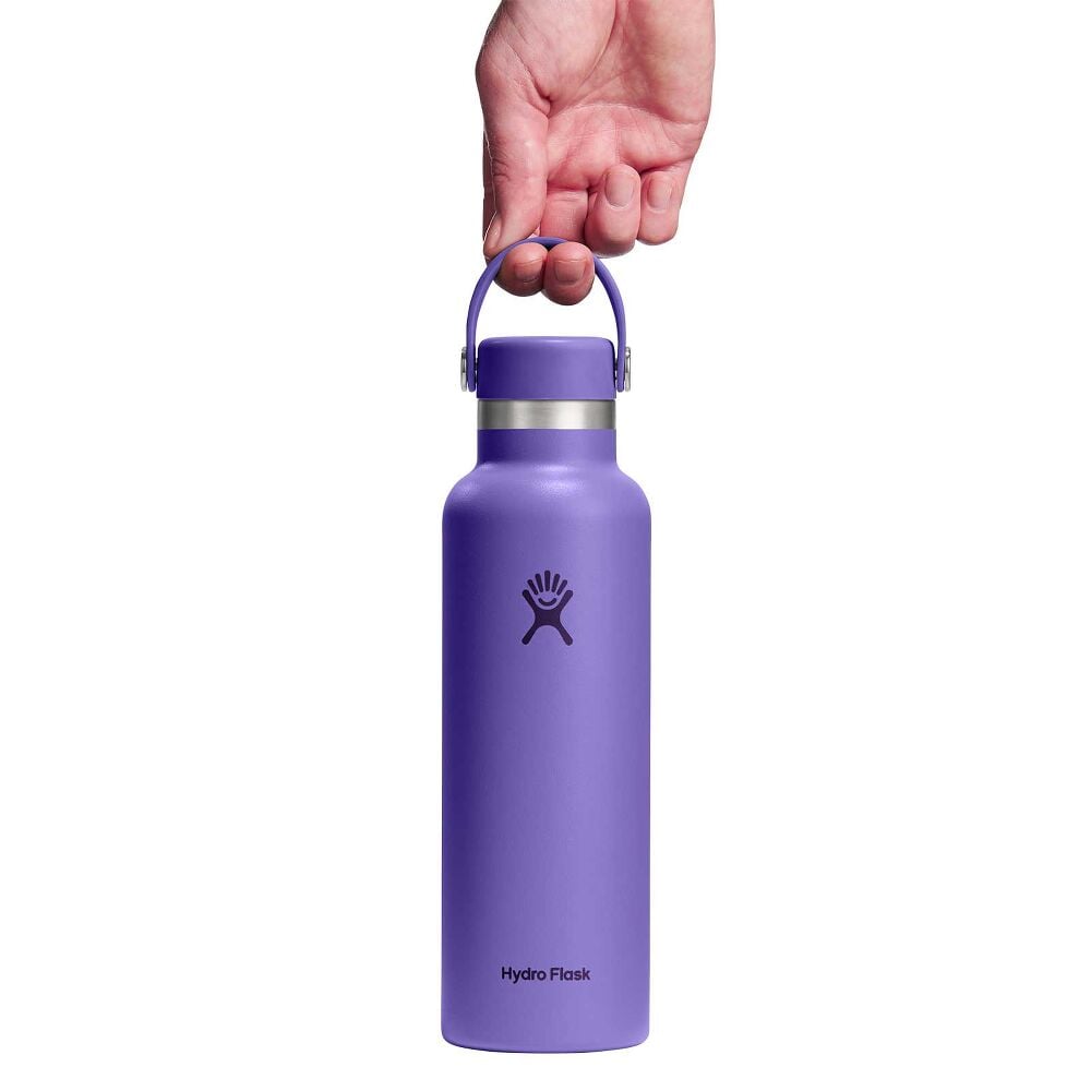 Purple Hydro Flask wide-mouth water bottle with stainless steel band below cap, matching purple flex strap handle, matte textured finish, and logo on front.